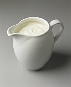 Sour cream in a milk jug