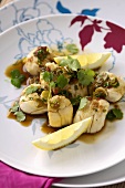 Steamed scallops with soy sauce and spring onions