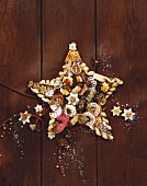 Christmas biscuits and sweets arranged in a star shape