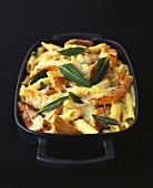 Pasta and pumpkin bake with sage leaves