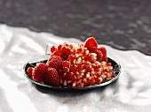 Pomegranate seeds with raspberries