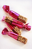 Muesli bars wrapped in red wrapping paper