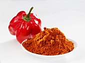 Ground paprika and a pepper