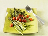 Grilled green asparagus with cocktail tomatoes