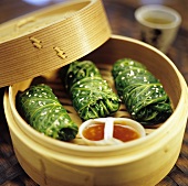 Stuffed savoy cabbage leaves with mince stuffing, sesame & chilli sauce