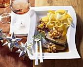 Roast wild boar with ribbon pasta and chanterelles