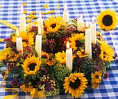 Wreath of sunflowers, helenium, viburnum berries & candles
