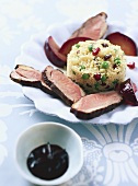 Marinated duck breast with couscous