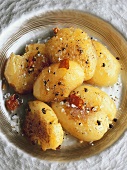 Deep-fried potato halves (India)