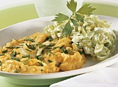 Scrambled eggs and cheese with leeks