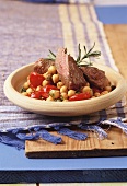 Pan-cooked chick-peas with lamb fillet