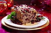 Meat terrine with pine nuts and cranberries