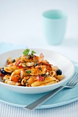 Penne with tomato sauce and king prawns