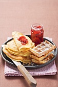 Pancakes, waffles and strawberry jam