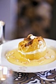Baked apple with nuts and custard