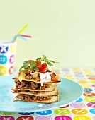 Stack of tortillas with mince for children