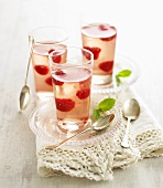 Elderflower jelly with raspberries in glasses