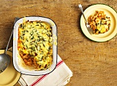 Pasta and tuna bake in baking dish and on plate