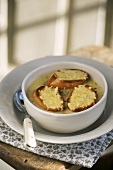 Onion soup with cheese baguette