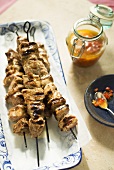 Grilled pork kebabs with pepper relish