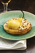 Puff pastry pear tart with almonds