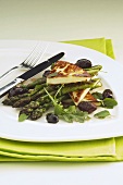 Grilled green asparagus with olives