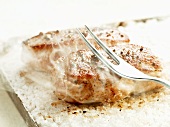 Veal steaks baked in salt