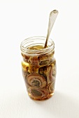 Anchovies with capers in a jar