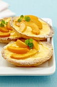 Peach tarts with vanilla custard