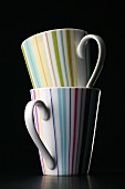 Two striped mugs, stacked