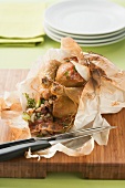 Chicken with figs cooked in paper