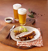 Roast pork with crackling cooked in beer