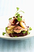 Beetroot and potato salad with fish and watercress