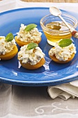 Apricots with ricotta, honey and mint