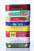 Various tins of sardines, stacked