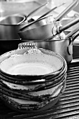 An assortment of pans in a commercial kitchen