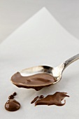 Spoon with melted chocolate