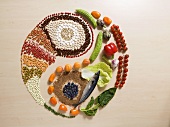 Yin-yang symbol in fresh ingredients and tablets