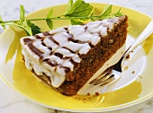 Piece of punch cake with lemon icing