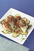 Redfish with courgettes and thyme and tomato crust