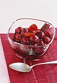 Sour cherry compote with cinnamon stick