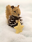 Christmas biscuit and squirrel in snow
