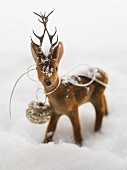 Deer figure in snow (Christmas decoration)