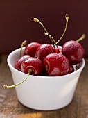 Fresh cherries in dish