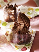 Chocolate leaves in glass jars