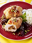 Chicken roulades with dried fruit filling and date sauce