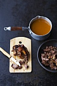 Making oxtail soup: stock and pieces of oxtail