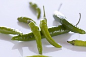 Several fresh green chillies