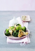 Broccoli with green gomasio and strips of marinated chicken
