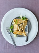 Galette filled with mushroom ragout, herbs